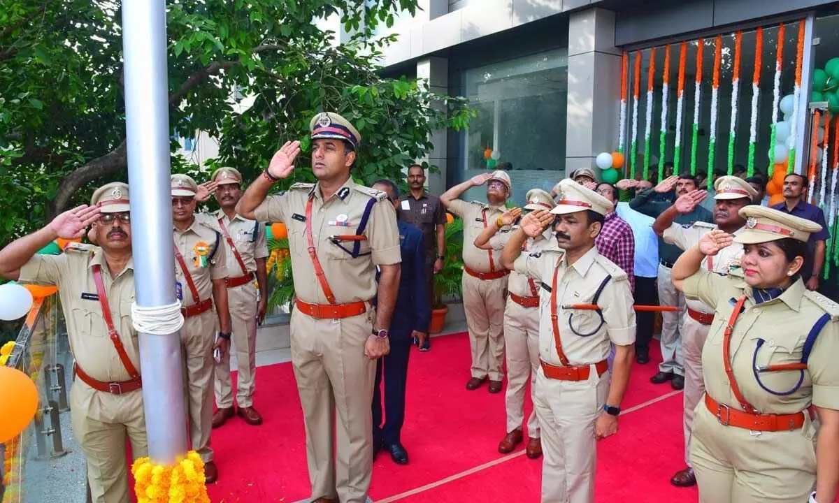 Commissioner of Police Kanthi Rana Tata saluting the national flag in Vijayawada on Tuesday