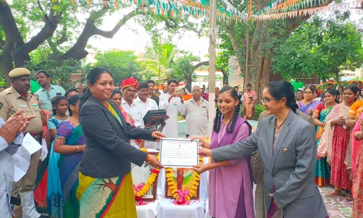 Principal District Judge Gandham Sunitha distributing prizes to the winners of the competitions organised by the District Legal Services Authority