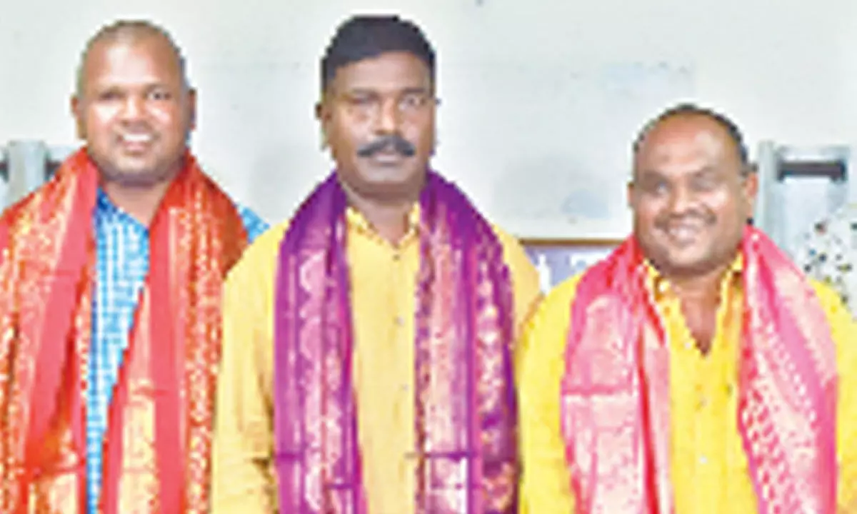 APPJA Tirupati unit president K Radhakrishna (middle),  secretary  R Lavanya  Kumar (right) and treasurer Sivaiah (left)