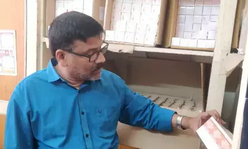 State AIDS Control Society PD Dr SBR Kumar Laghimsetty inspecting medicines at ART Centre in Vijayawada on Monday