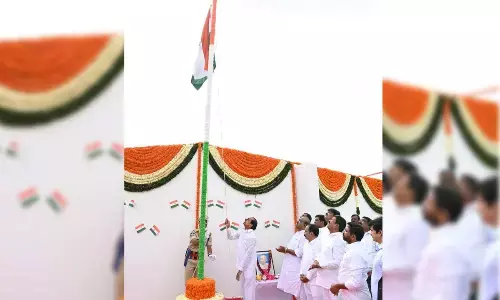 KCR hoists National Flag at Pragati Bhavan