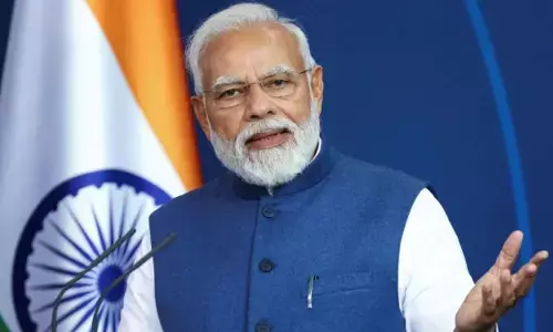 PM Modi wears bandhani print Rajasthani headgear for I-Day celebrations