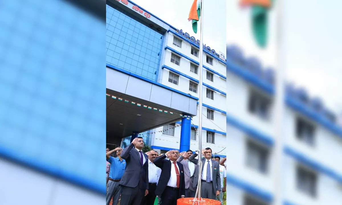 K Vijayanand, Special Chief Secretary (Energy), and other officials participate in the Independence Day  celebrations at the Vidyut Soudha in Vijayawada on Tuesday