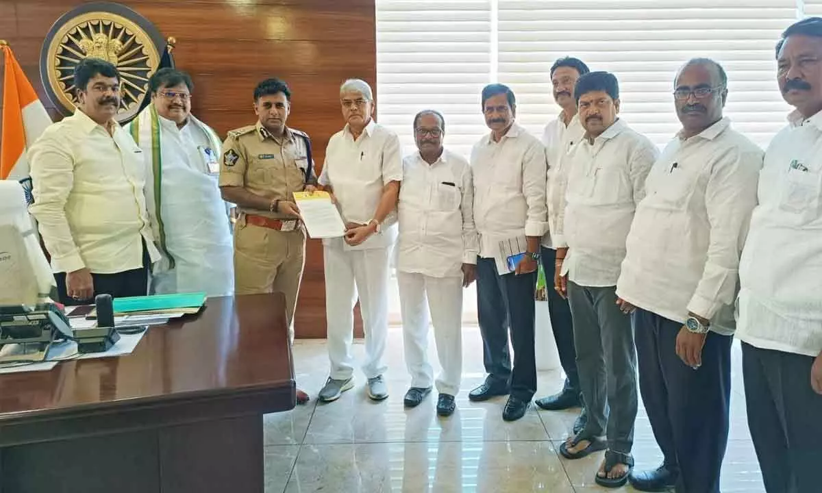 TDP Krishna district president Konakall Narayana Rao, NTR district president Nettem Raghuram, former ministers Kollu Ravindra, Devineni Uma Maheswara Rao and others submitting a representation to Vijayawada commissioner of police Kanthi Rana Tata in Vijayawada on Wednesday