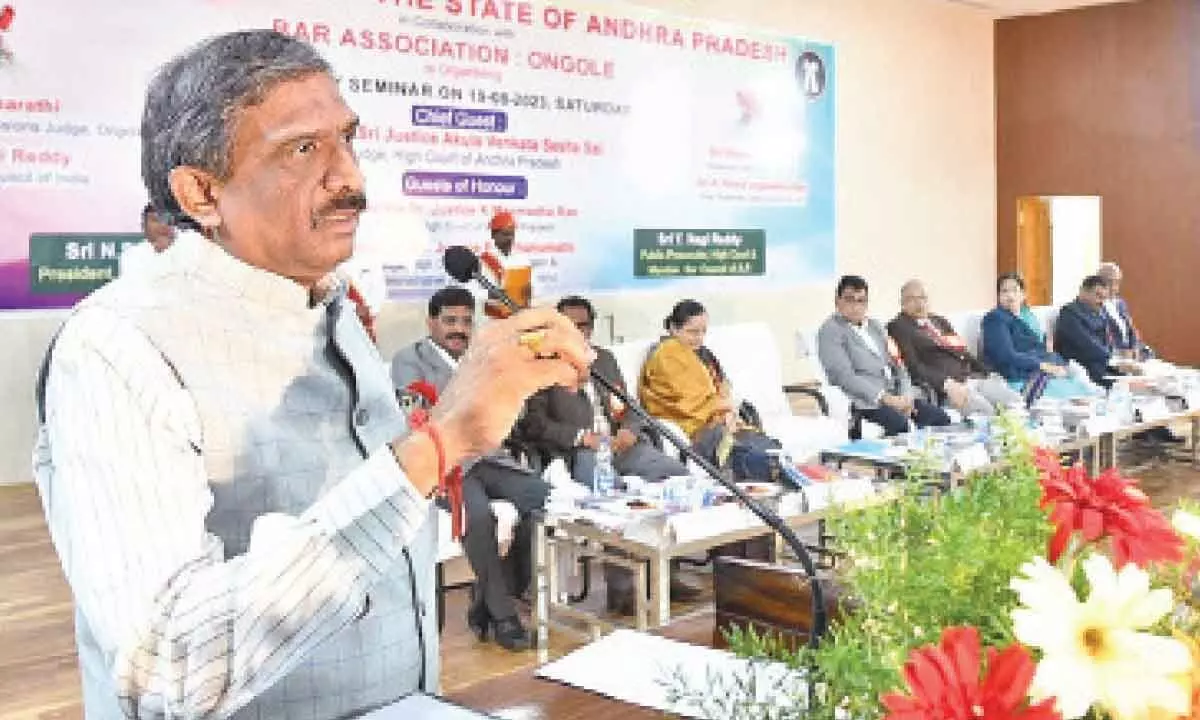AP High Court Judge Justice A V Seshasai speaking at a seminar jointly organised by the AP Bar Association, Indira Priyadarsini Law College and the Ongole Bar Association in Ongole on Saturday