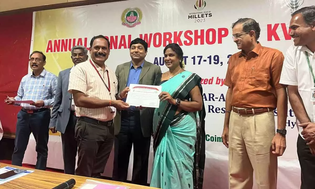 RASS-KVK Head Dr S Sreenivasulu receiving ‘Appreciation Certificates’ from Tamil Nadu Agriculture University (TNAU) Vice-Chancellor Geeta Lakhmi at valedictory of KVK zonal workshop in Coimbatore in Tamil Nadu on Saturday