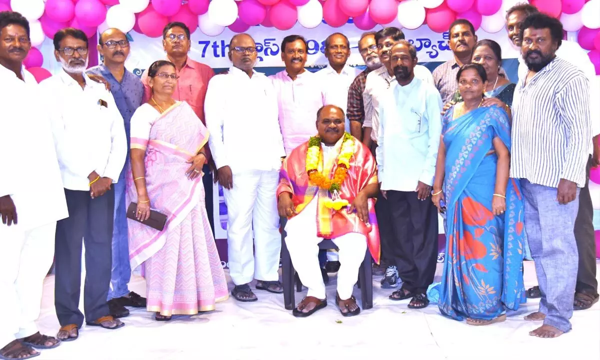 Alumni of St Xavier’s High School felicitating their classmate Ayinabattina Ghanasyam during  their golden jubilee celebrations at the school in Ongole on Sunday