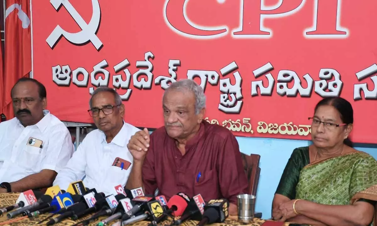 CPI national secretary K Narayana addressing a press conference  in Vijayawada on Sunday.