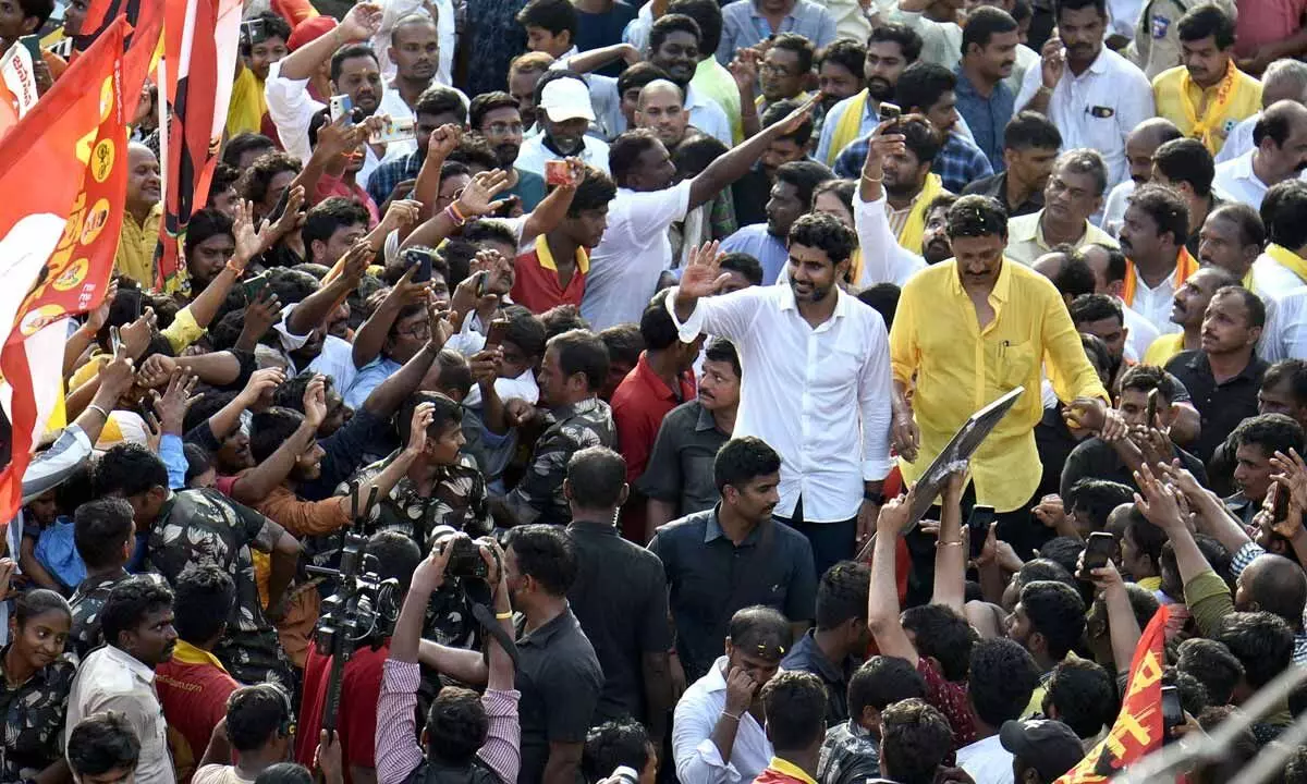 TDP national general secretary  Nara Lokesh greeting people during his Yuva Galam padayatra at Patamata NTR  Circle in Vijayawada on Sunday. Photo: Ch Venkata Mastan