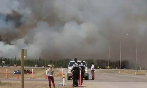 Wildfires scorch US Hawaii, Canada, Spanish island, causing heavy losses