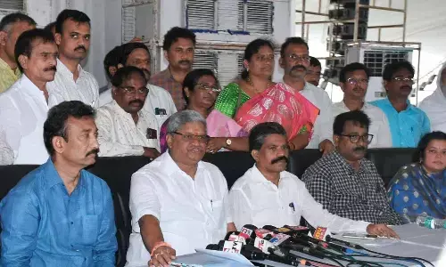 APNGOs Association State president Bandi Srinivasa Rao, general secretary K V Siva Reddy and other State leaders addressing a press conference at the IGMC Stadium in Vijayawada on Sunday Photo: Ch Venkata Mastan