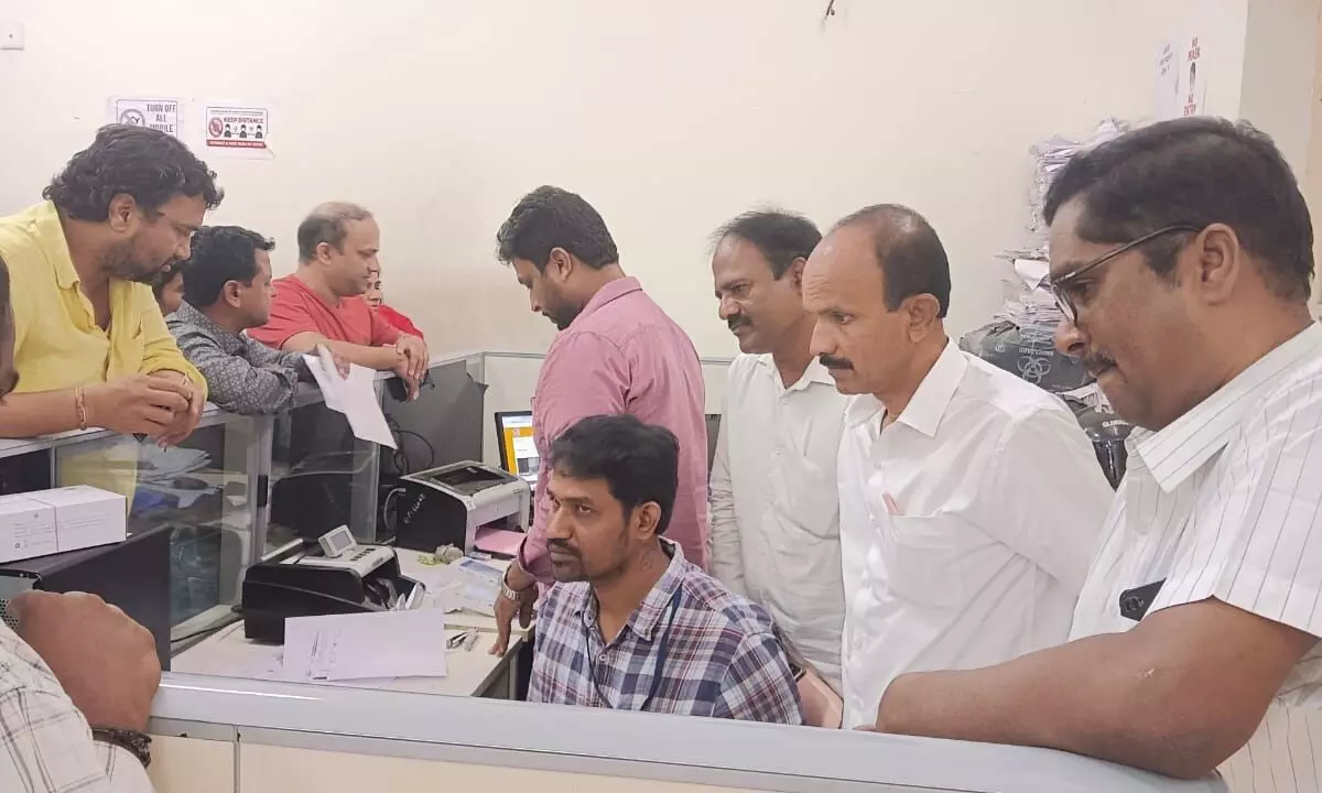 Members of media committee on Srivani Trust studying the issuing of off-line tickets at JEO office in Tirumala on Monday