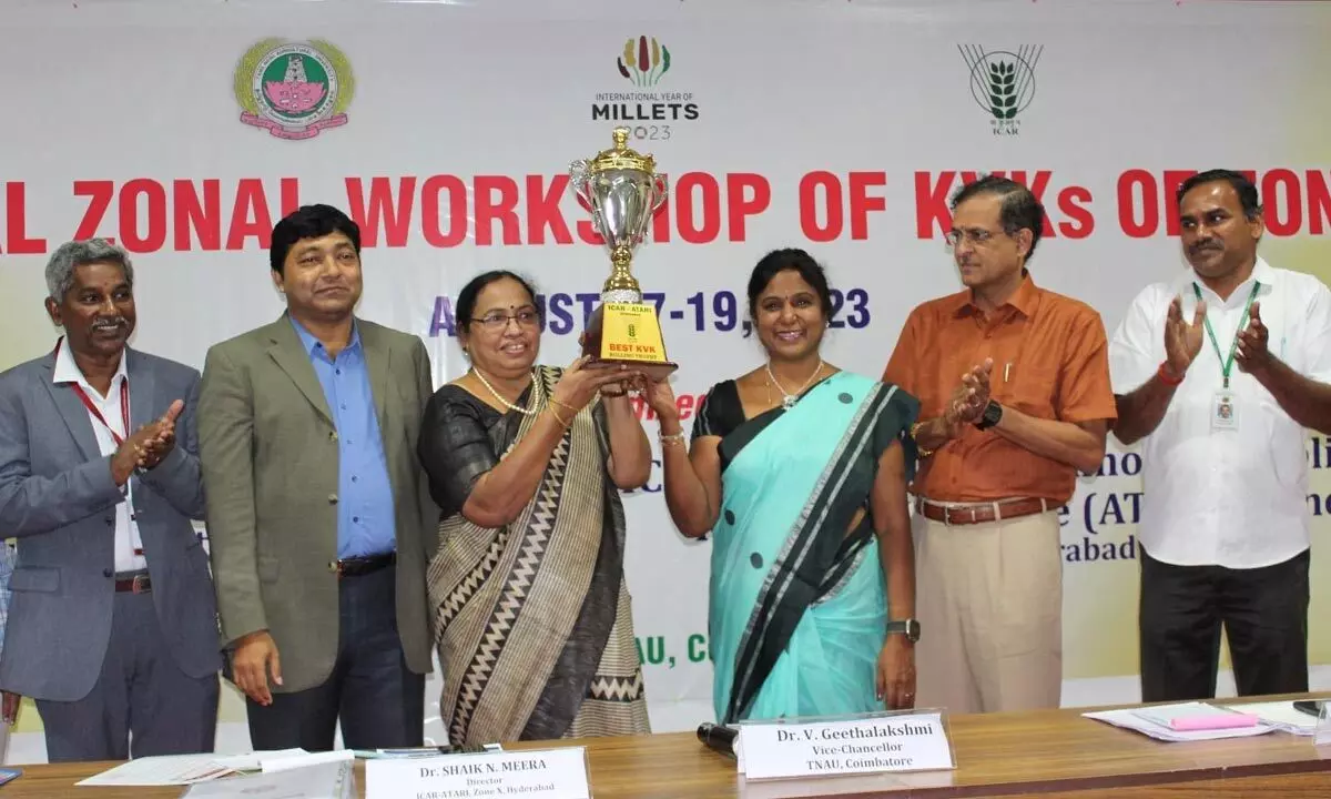 Senior Scientist and Head of KVK Yagantipalle, G Dhanalakshmi,  receiving trophy from the hands of Dr V Geetha Lakshmi, the Vice-Chancellor of Tamil Nadu Agriculture University, in Coimbatore