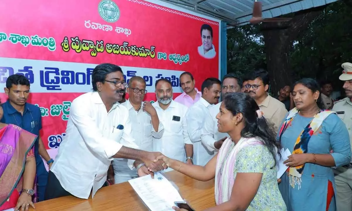 Transport Minister Puvvada Ajay Kumar presenting free LLR documents to youths under the Puvvada Foundation in Khammam on Tuesday