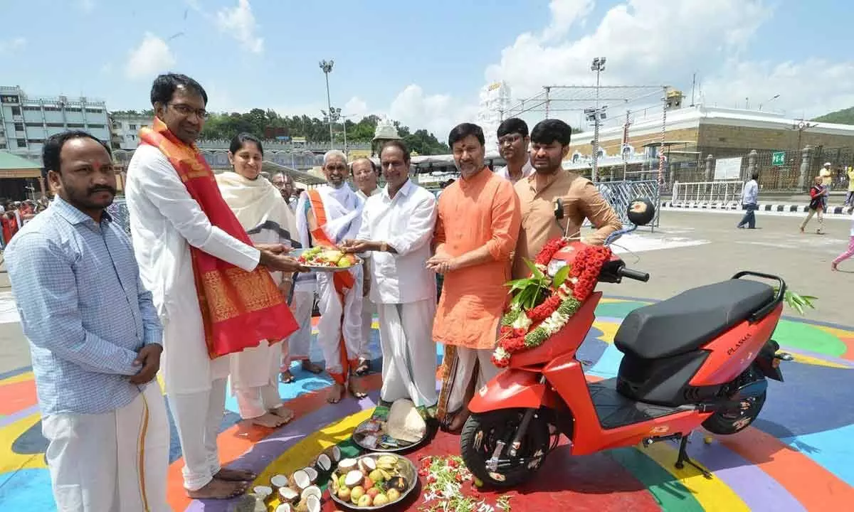 Puja is being performed to an electric vehicle at Tirumala on Tuesday