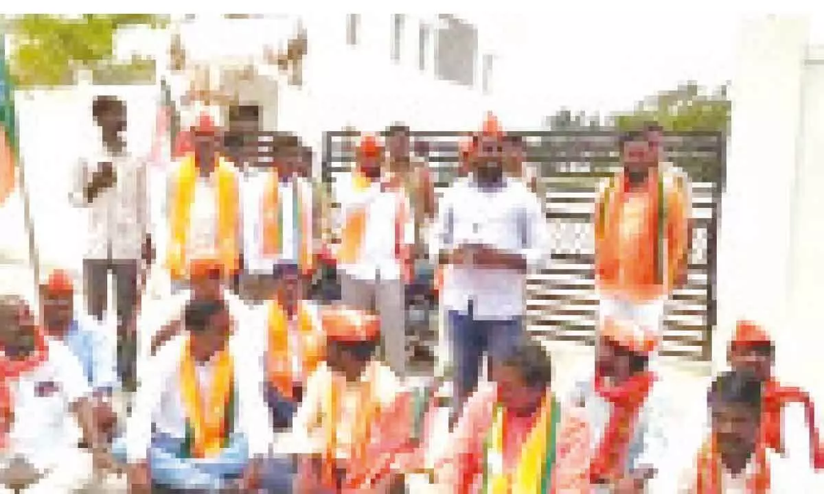 BJP cadres staging protest at the MLA camp office in Kodangal on Wednesday