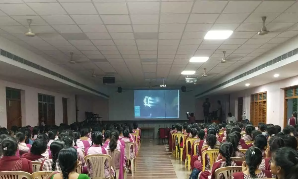 Students watching the successful launch of Chandrayaan-3 at Maris Stella College auditorium in Vijayawada on Wednesday