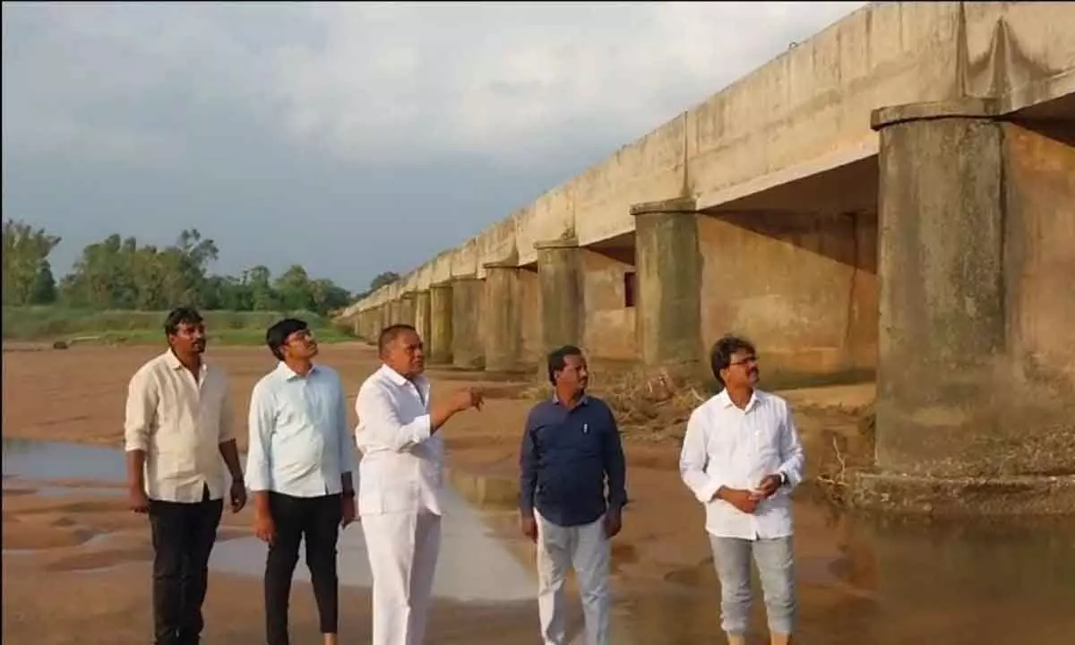 Former Deputy Speaker Mandali Buddha Prasad inspects Puligadda Aqueduct in Krishna district on Wednesday