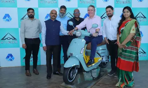 British Dy High Commissioner Gareth Wynn Owen launching electric scooter at Avera showroom in Vijayawada on Wednesday