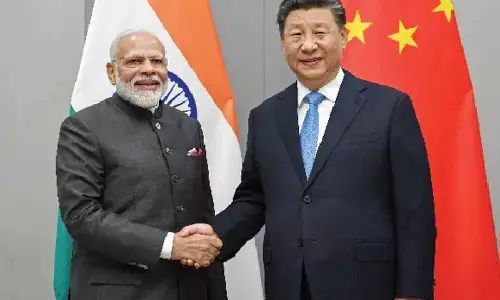 Narendra Modi, Xi Jinping seen having brief exchanges in Johannesburg