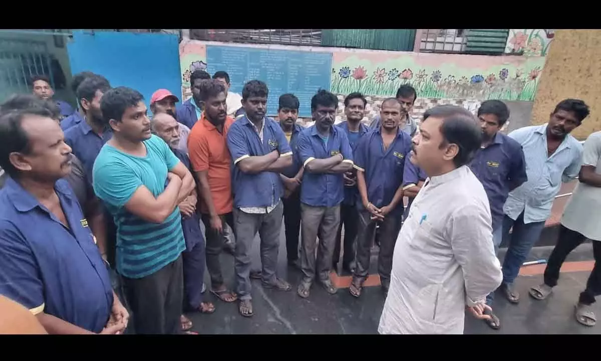 MP GVL Narasimha Rao interacts with passengers and coach cleaning staff
