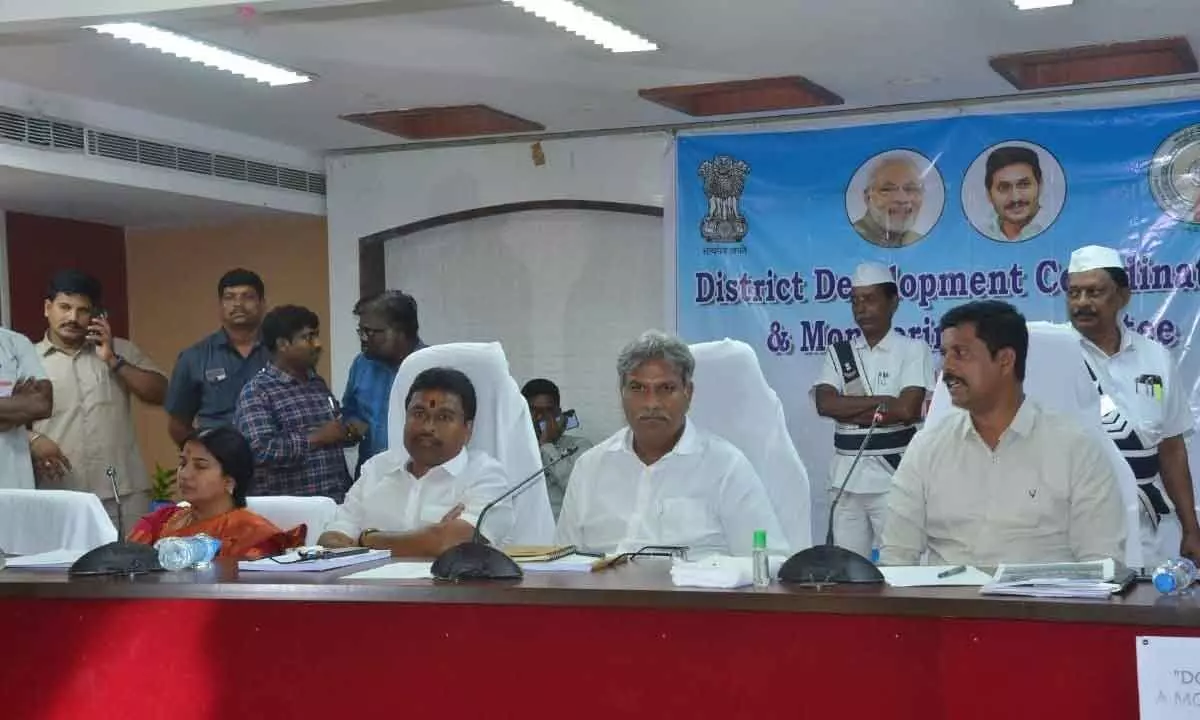 Vijayawada MP Kesineni Nani speaking at the NTR District Development Co-ordination and Monitoring Committee meeting at the Collectorate in Vijayawada on Saturday. MLA Vellampalli Srinivasa Rao and NTR District Collector S Dilli Rao are also seen.