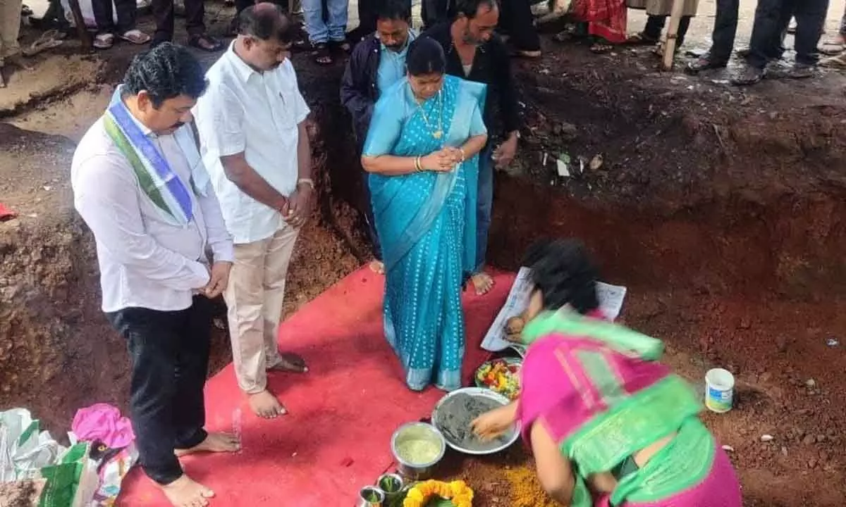 Mayor G Hari Venkata Kumari and KK Raju laying foundation  stone for the development works in Visakhapatnam on Saturday