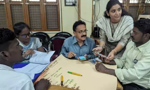 Participants in active discussion at the workshop on holistic approach to farming in Anantapur on Saturday.