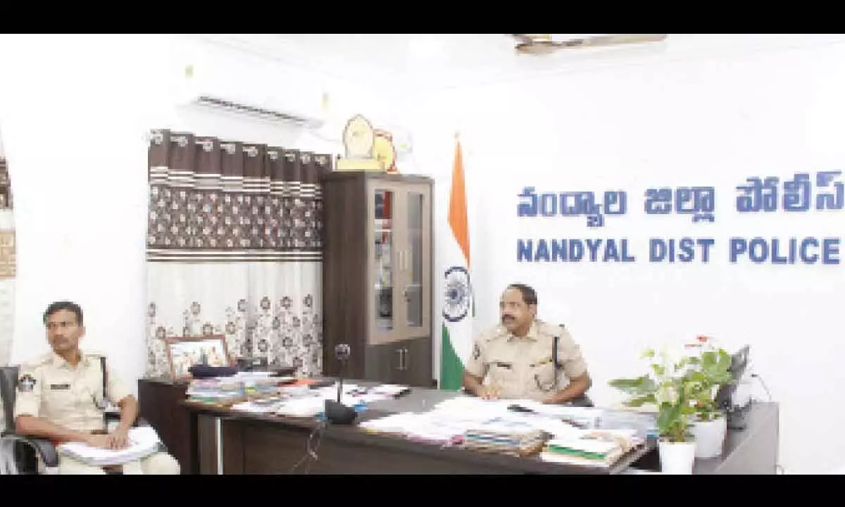 Superintendent of Police K Raghuveer Reddy conducting video conference with the police personnel in Nandyal district on Sunday.