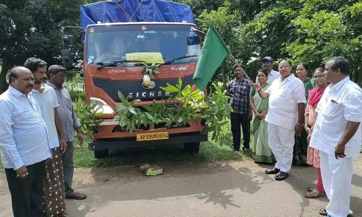 MLA S V Ch Appala Naidu flagging of the vehicle loaded with jaggery blocks at Bobbili in Vizianagaram district on Sunday