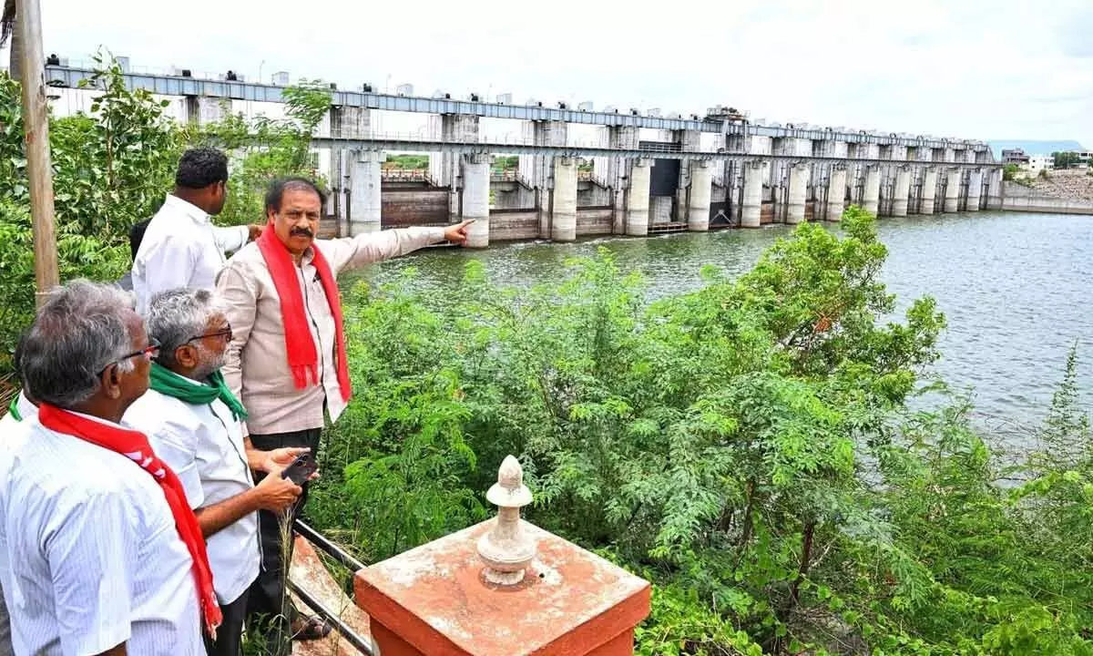 CPI State secretary K Ramakrishna inspecting Mallavaram dam in Ongole on Monday