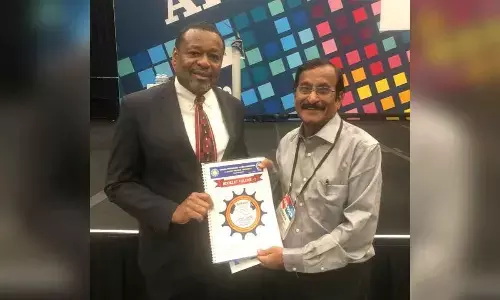 Spruha Psychology Alumni Association of AKNU president Sunkara Nagendra Kishore presenting a booklet depicting Spruha alumni activities to American Psychological Association CEO Dr Arthur C Evans at APA International Convention-2023 in Washington DC, USA (File photo)