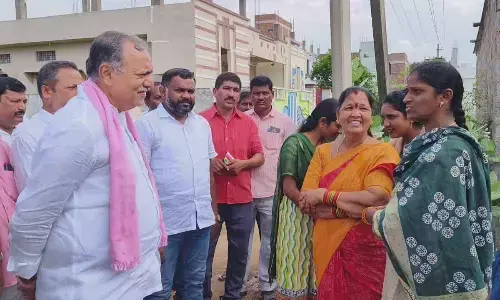 Bhupalpally MLA Gandra Venkataramana Reddy interacting with the residents of 9th ward as part of Basti Bata in Bhupalpally on Sunday