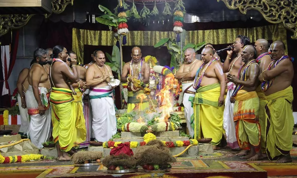 Priests performing Purnahuti marking the completion of three-day Pavitrotsavan of Lord Venkateswara Swamy temple in Tirumala on Tuesday