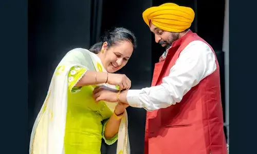 Punjab CM stops speech as woman approaches to tie him rakhi