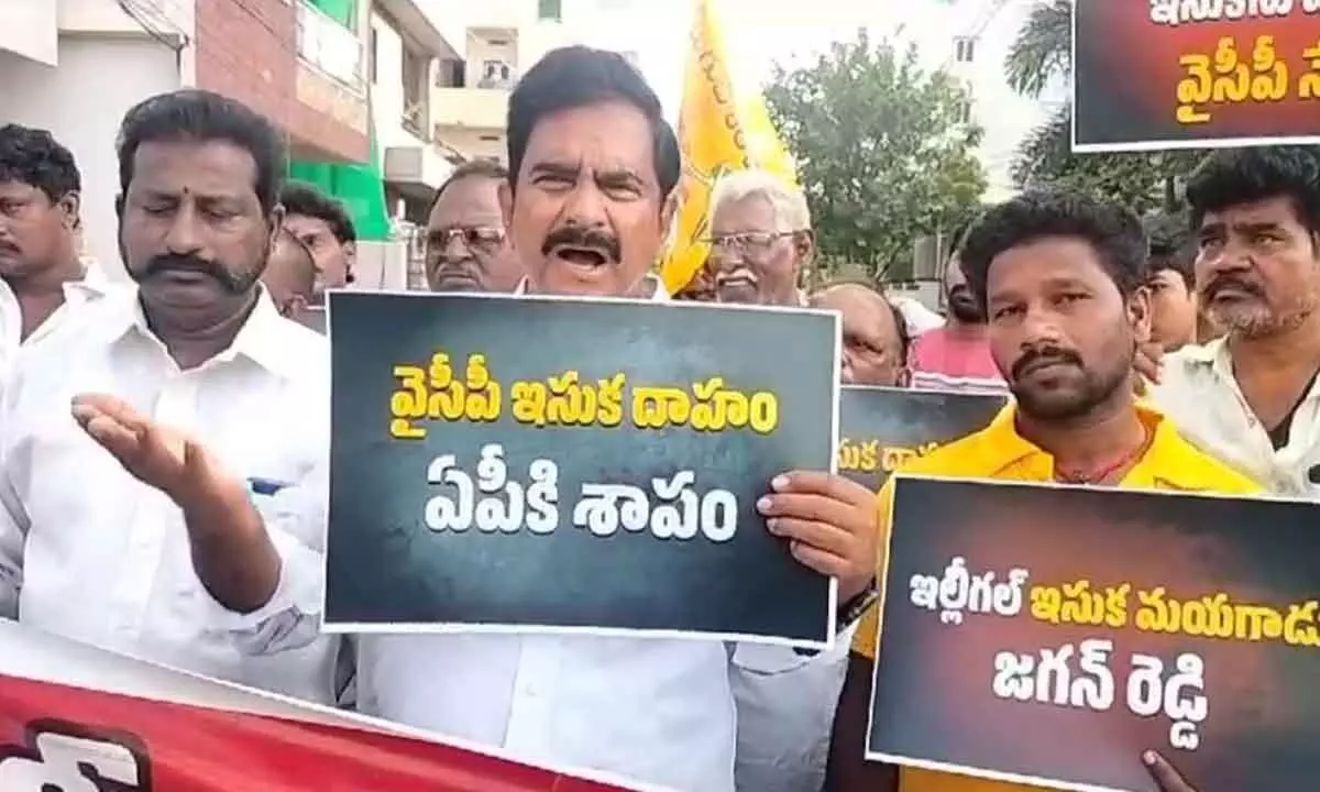 Former Minister Devineni Umamaheswara Rao staging a protest at Gollapudi on Wednesday