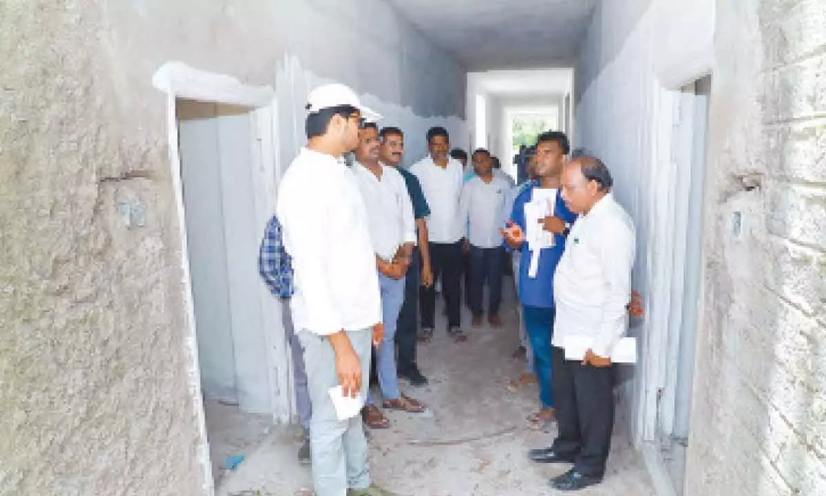 District Collector VP Gautham inspecting double bed houses construction works in Khammam on Wednesday.