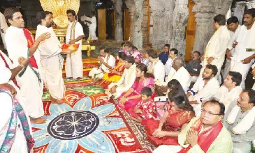 TTD Board Member Sidda Sudheer Kumar and his family members receiving vedasirvachanam after he took oath at the shrine in Tirumala on Wednesday.