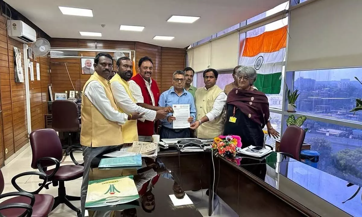 Akhila Bharat Panchayat Parishad national vice-president Dr Jasti Veeranjaneyulu and members of AP Panchayat Parishad submitting a memorandum to the officials in the Prime Ministers Office in New Delhi on Thursday