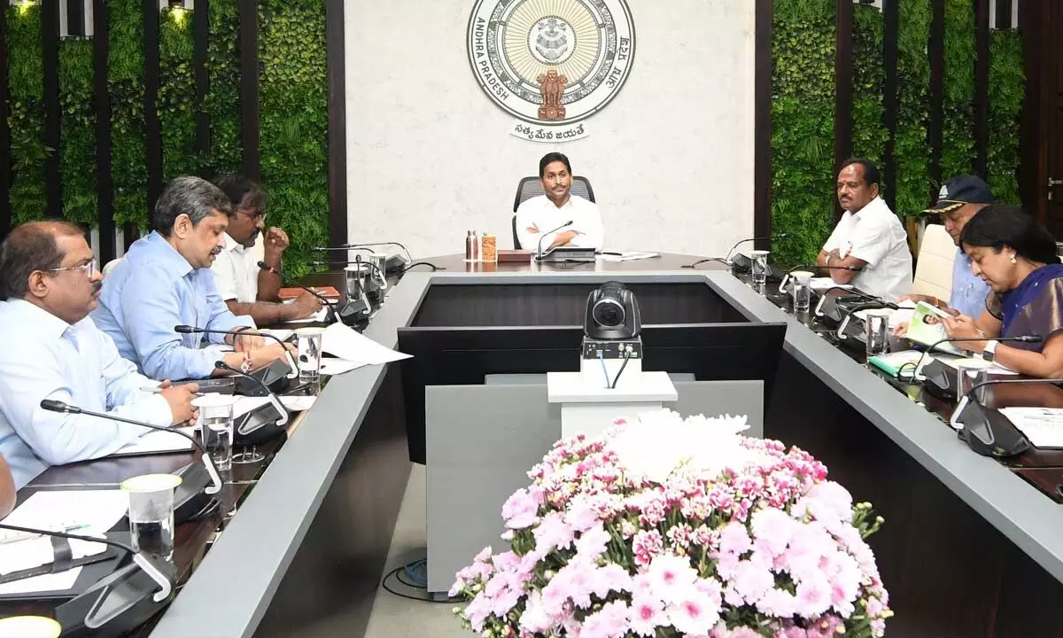 Chief Minister Y S Jagan Mohan Reddy holding a review meeting on ‘Saswatha Bhu Hakku-Bhu Raksha’ programme at his camp office in Tadepalli on Thursday