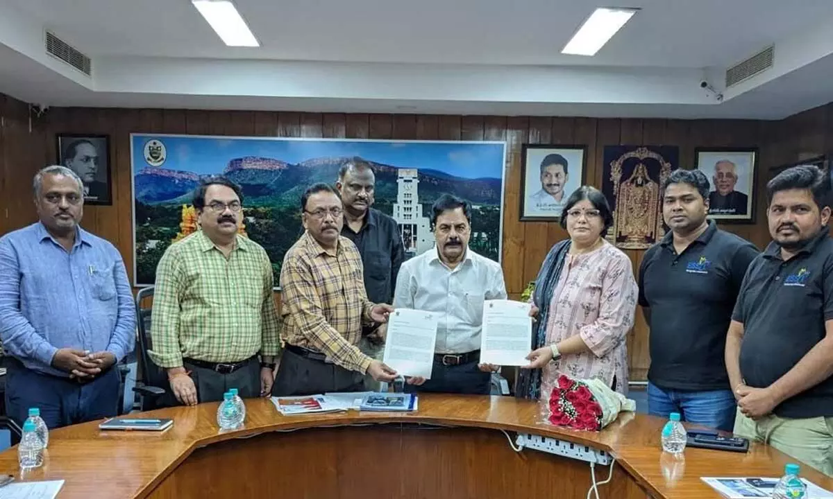 SVU Registrar Prof OMd Hussain and Dr Abhilasha Gaur of ESSCI exchanging MoU in the presence of Vice Chancellor Prof K Raja Reddy. Dean Pror S Vijayabhsaksar Rao and others are seen.