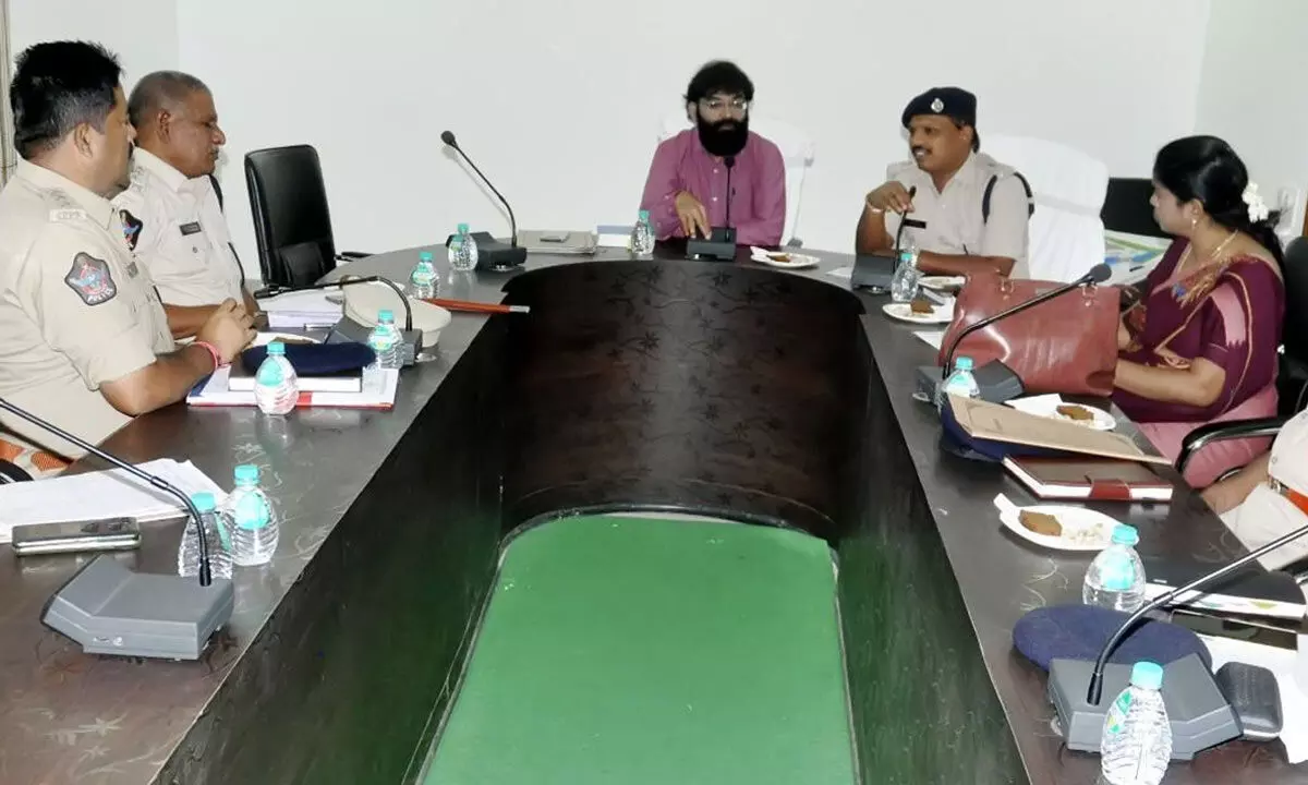 District Senior Judge Dr Karuna Kumar holds meeting with district police officials on the conduct of National Lok Adalat, in Tirupati on Thursday