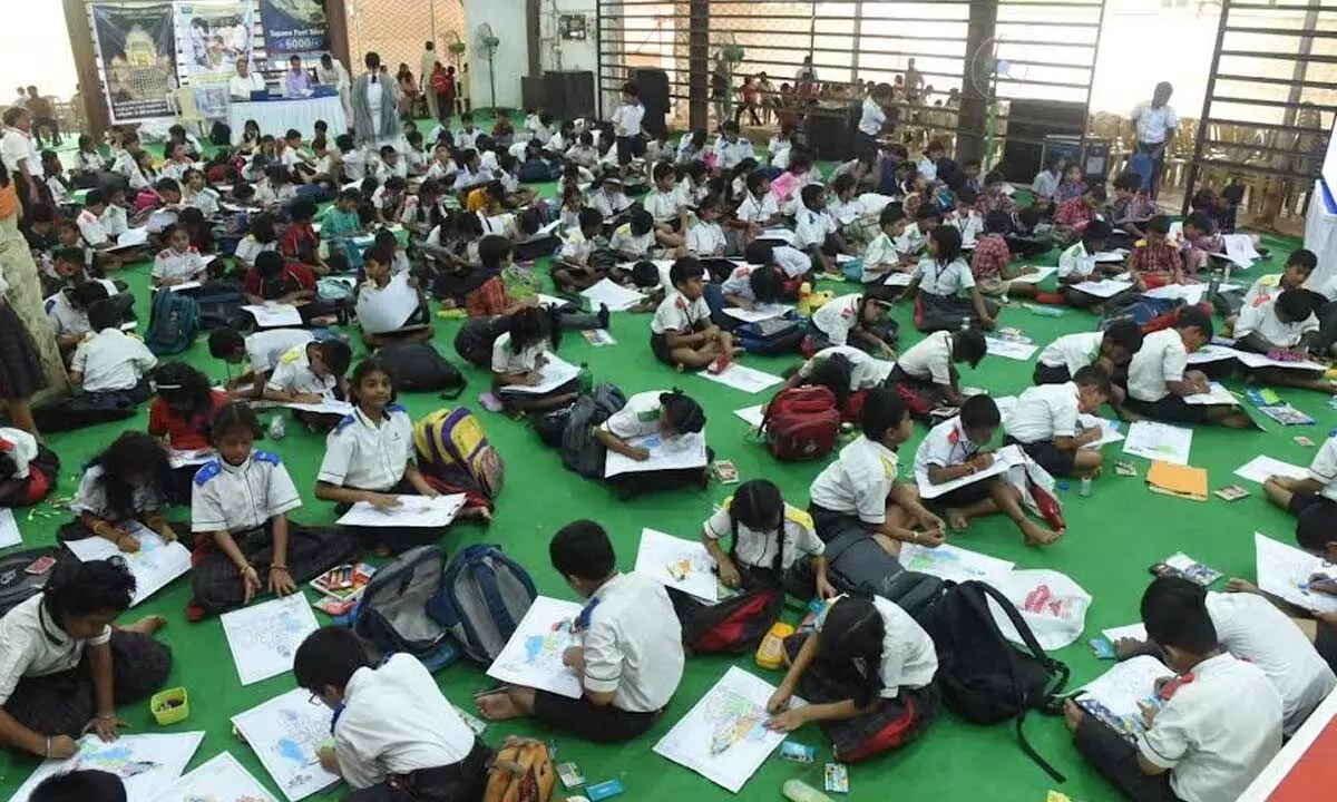 Students participating in the colouring contest organised as a part of ‘Heritage Fest-2023’ by Hare Krishna Movement in Visakhapatnam on Thursday