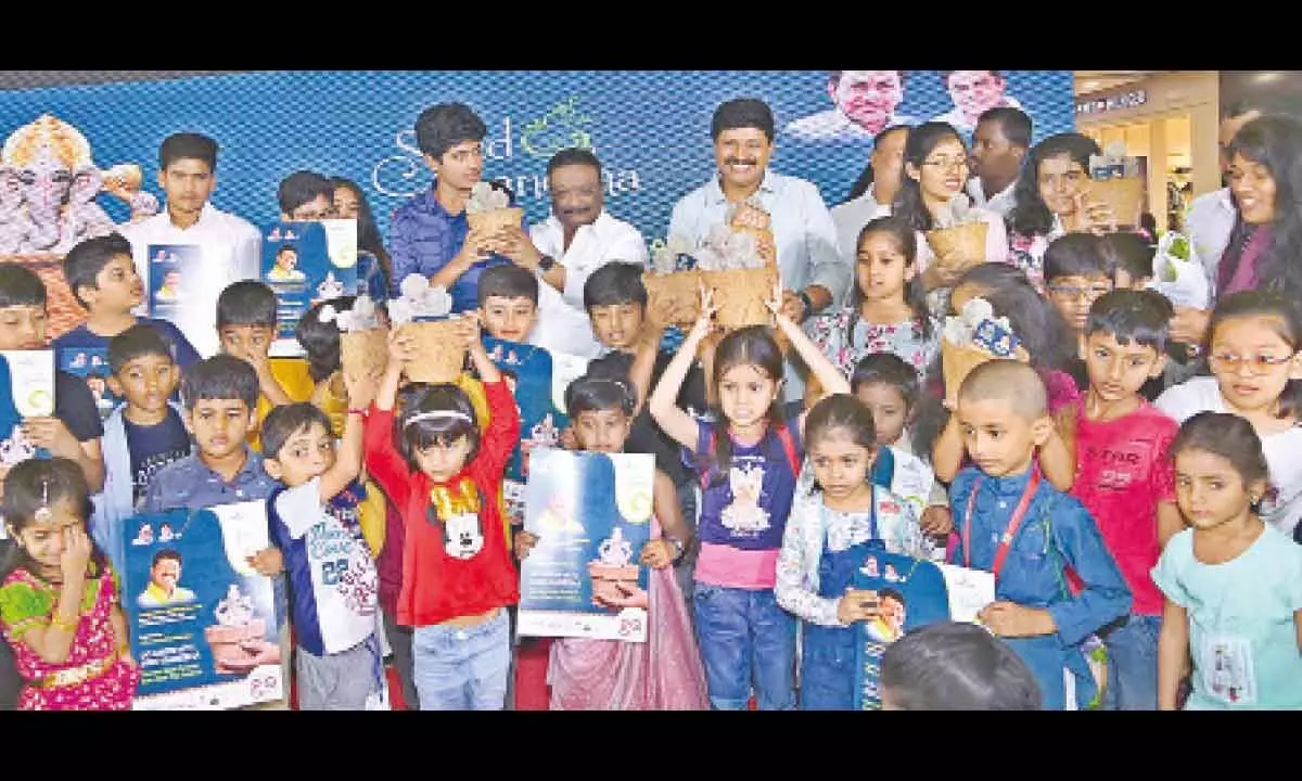 MP Santhosh Kumar distributes seed Ganesh idols to children