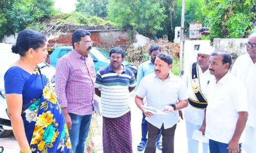 District in-charge Collector K Srinivasulu inspecting voters reverification process in Tangutur mandal on Sunday