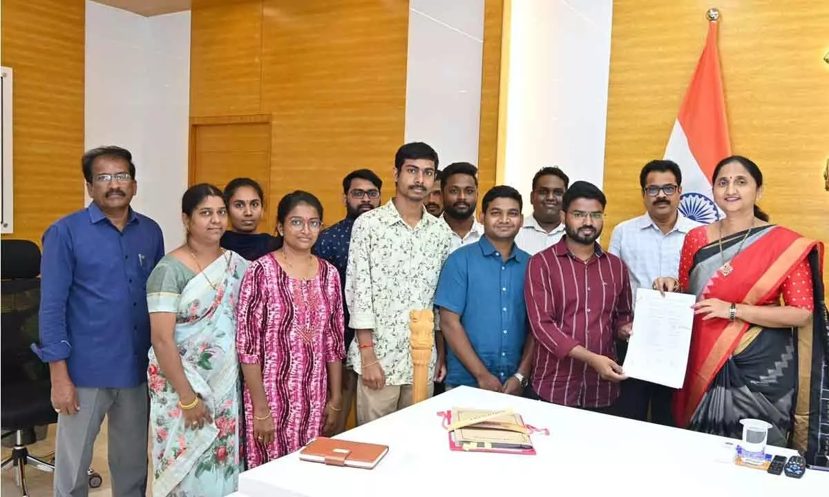 District Collector K Madhavi Latha handing over appointment orders to junior assistants at the Collectorate in Rajamahendravaram on Monday