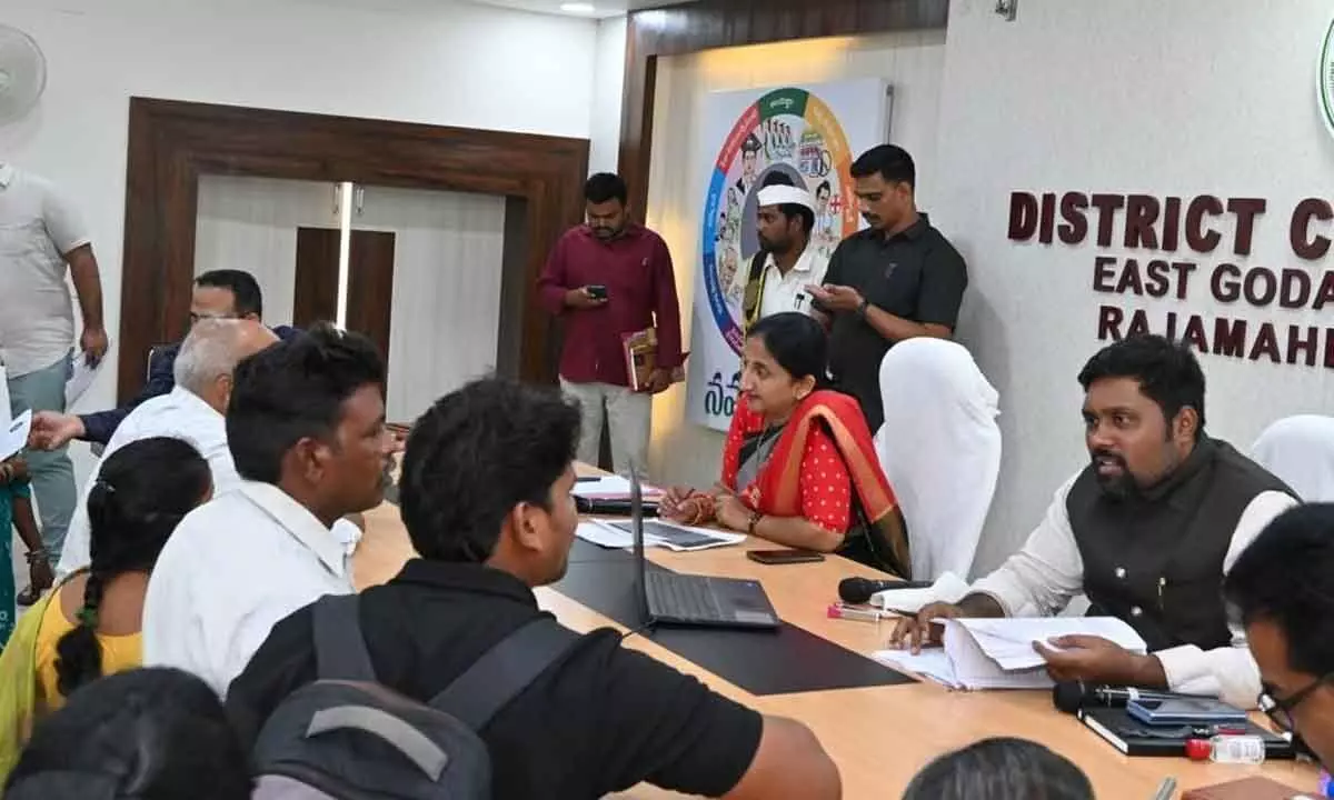 District Collector K Madhavi Latha and Joint Collector N Tej Bharat receiving petitions from people during Spandana at the Collectorate in Rajamahendravaram on Monday
