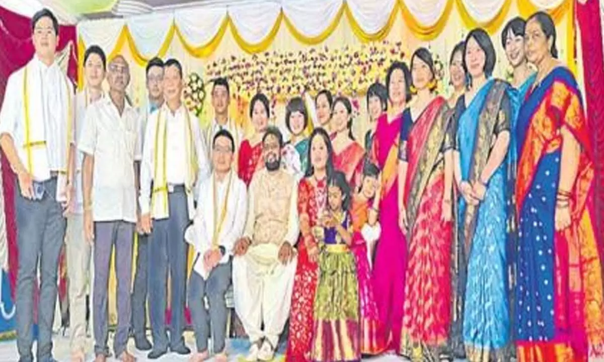 Krishna district man and Taiwan girl gets married in Telugu tradition