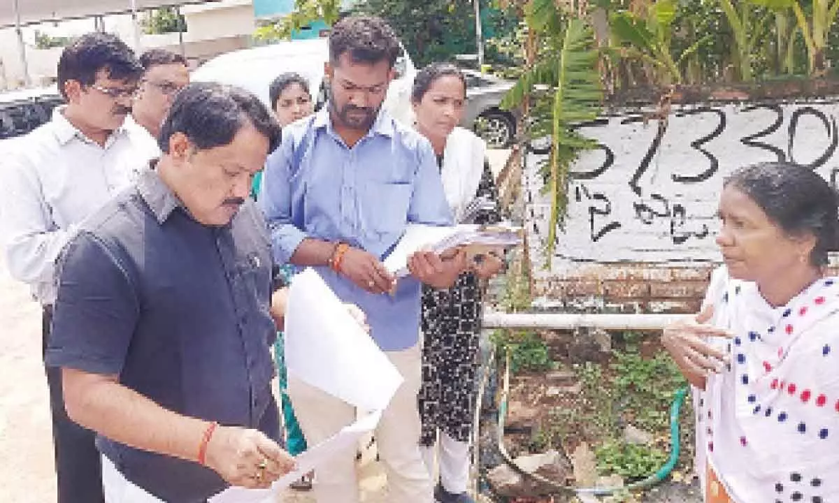 Prakasam district in-charge Collector K Srinivasulu inspecting voters re-verification in Alluru village on Monday