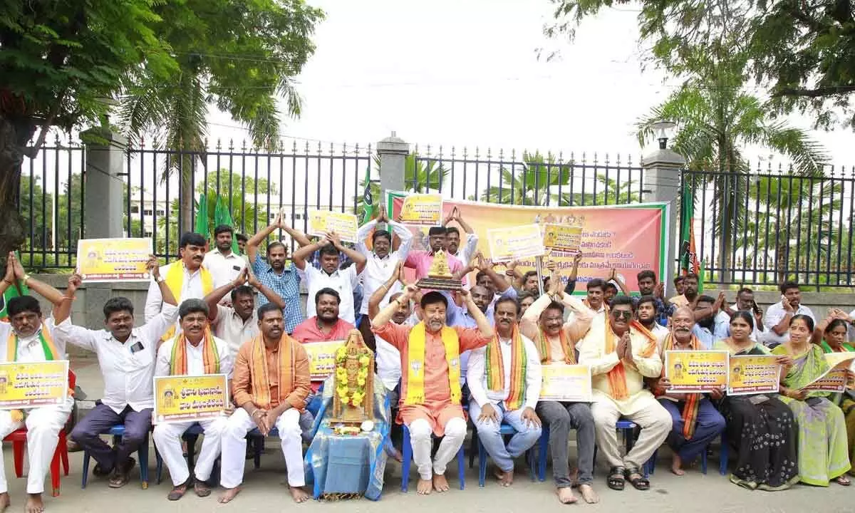 BJP activists staging a dharna near the TTD Administrative Building in Tirupati on Monday